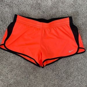 Nike running shorts NWOT orange/black size M